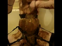 Lady pouring shit all over her body